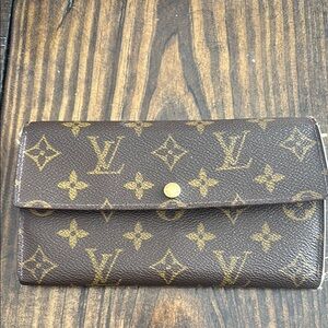 Louis Vuitton Brown Monogram Wallet with Flap Closure